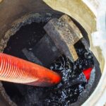 Clogged,Septic,Tank.,Emptying,The,Septic,Tank.,Pipe,In,The